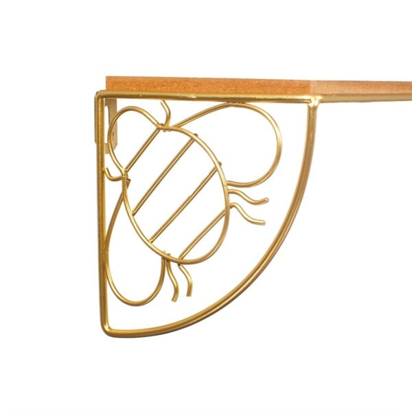 Dekorativní polička s motivem zlaté včelky.